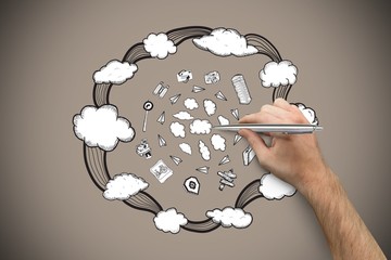 Composite image of hand holding a silver pen