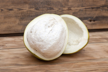 pomelo on old wooden table