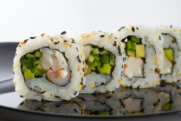 Sushi roll with sesame