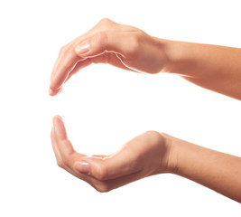 Two human hands showing sphere
