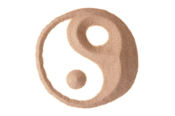 yin yang symbol in sand