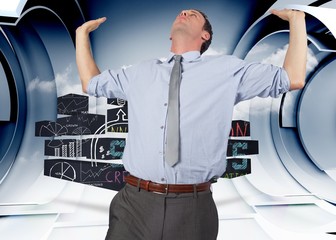 Obraz premium Composite image of businessman standing with hands up