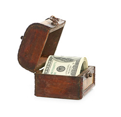 Dollar-bills in the old wooden treasure chest