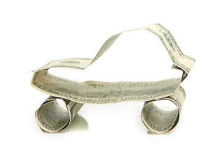 car made from dollar isolated on white background