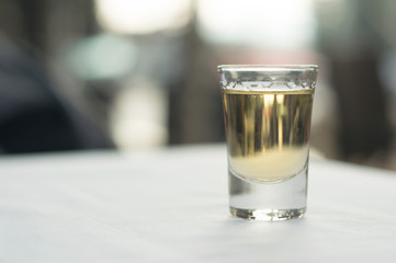rakia glass on table