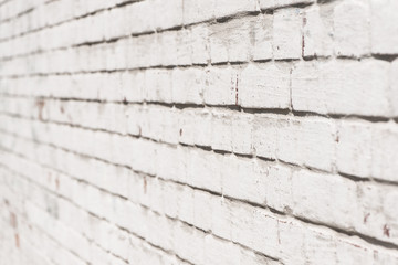 Textured background of white brick wall
