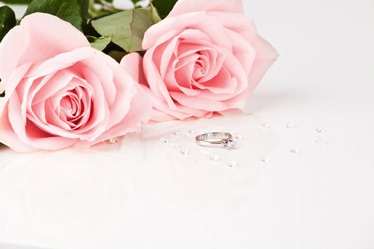 Beautiful diamond ring with pink roses