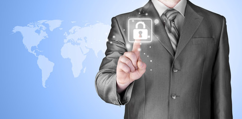 Businessman touch lock on world map  background