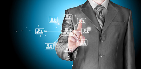 Businessman pressing modern social buttons