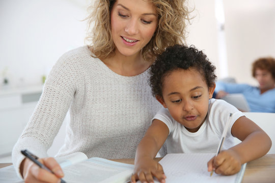 Mom And Kid At Home Making Drawing