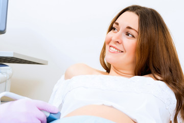 Naklejka premium pregnant woman on reception at the doctor