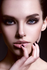 Close-up beauty portrait of beautiful model with bright make-up