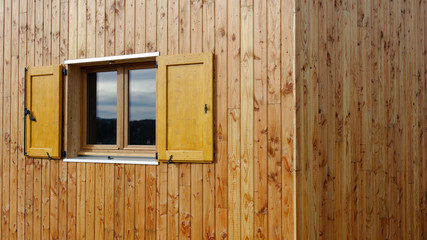 Obraz na płótnie Canvas Dom z drewna drewno okno