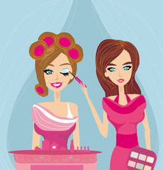 professional make-up artist applying eyeshadow