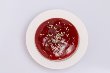 Tomato ketchup and dry rosemary.