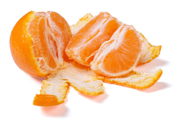 peeled mandarin segments isolated on white background. close-up