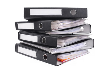 Pile of black ring binders