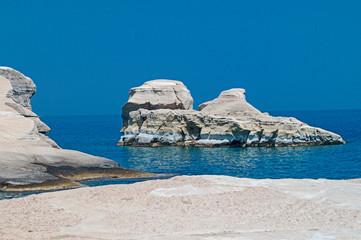 Caves and rock formations by the sea at Sarakiniko area on Milos - 60586104