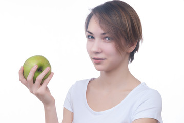 Pretty young girl with green apple