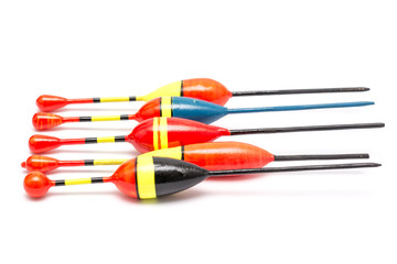 Red And Yellow Colored Fishing Corks Isolated On White