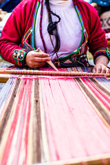 Traditional hand weaving in the Andes Mountains, Peru