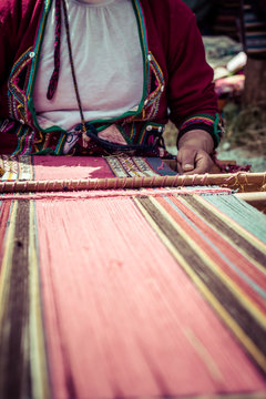 Traditional hand weaving in the Andes Mountains, Peru