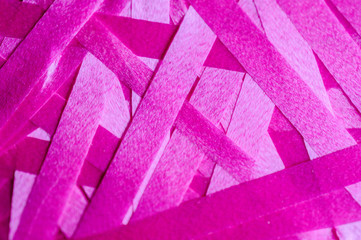 Macro shot of pink paper strips