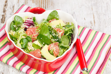 Salad. Spinach and quinoa salad with grapefruit and avocado