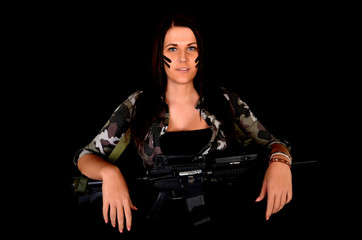 Fototapeta premium beautiful sexy soldier holding gun