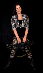 beautiful sexy girl holding gun