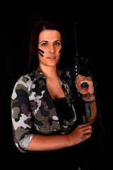 Fototapeta premium beautiful sexy girl holding gun