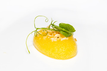 Molecular Cuisine mango jelly on white background