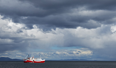 Red ship at the Strait of Magellan