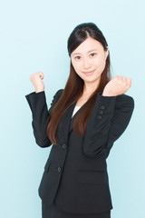 young asian businesswoman cheering