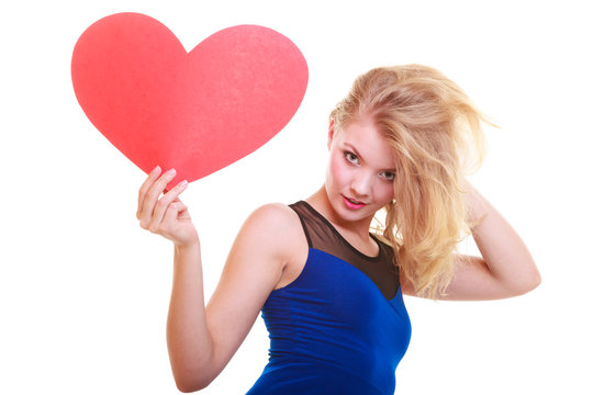 Red heart. Love symbol. Woman hold Valentine day symbol.