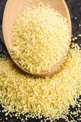 couscous in wooden spoon