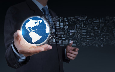 businessman hand the world and business strategy