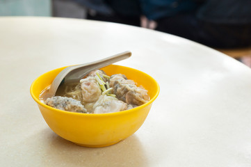Shrimp wanton soup served in a traditional Hong Kong cafe