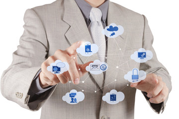 Businessman working with a Cloud Computing diagram on the new co