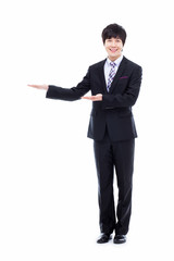 Young Asian business man showing something