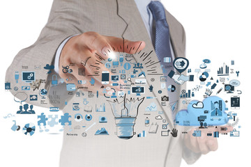 businessman hand drawing creative business strategy with light b