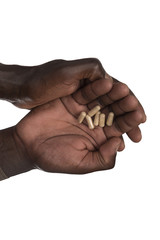 black hands with pills