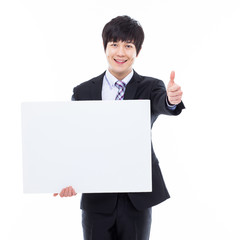 Young Asian business man holding a blank banner