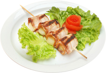 Bacon spits with yellow cheese and fresh green salad