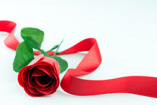 Red rose and ribbon