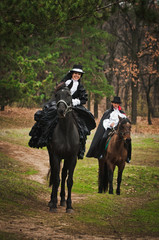 man and woman in costume