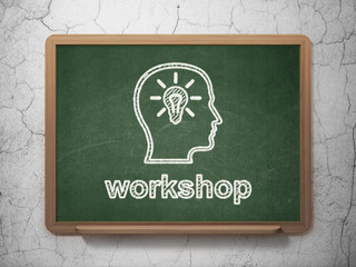 Education concept: Head With Lightbulb and Workshop on