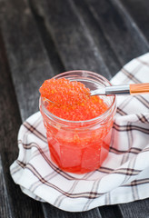 Spoon of red caviar