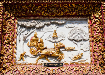 Ancient golden carving wooden window of Thai temple. Thailand
