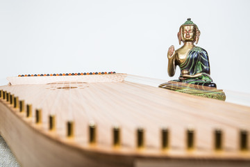 Obraz premium kantele with buddha